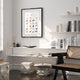 Framed DOGUE poster featuring illustrated dogs by All the Ways to Say in a modern living room interior
