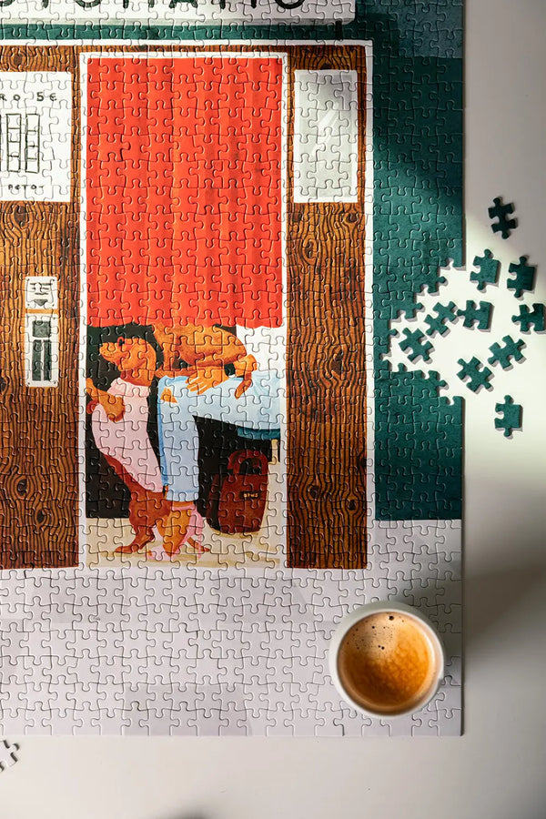 Fotomatic - Puzzle 1000 pieces: a relaxing puzzle session with a cup of coffee and scattered pieces.